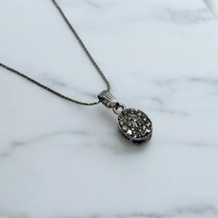 Gleaming Oval Charm Pendant