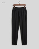 Secondhand Branded Men Sports Trousers by DECATHLON, Black Polyester fabric, Premium condition, for MENS - Online Thrift Shop Islamabad Pakistan