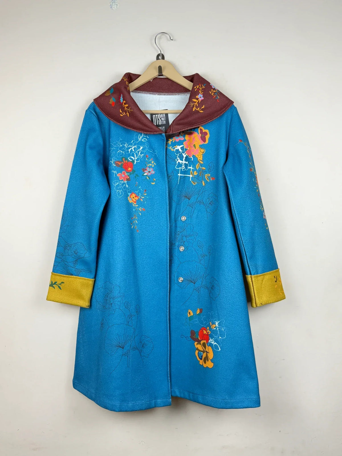 Shop Premium Women's Winter Long Coat by Unknown | Preloved Branded Clothes | Blue Polyester | Women | OTS Thrift Store Peshawar Pakistan