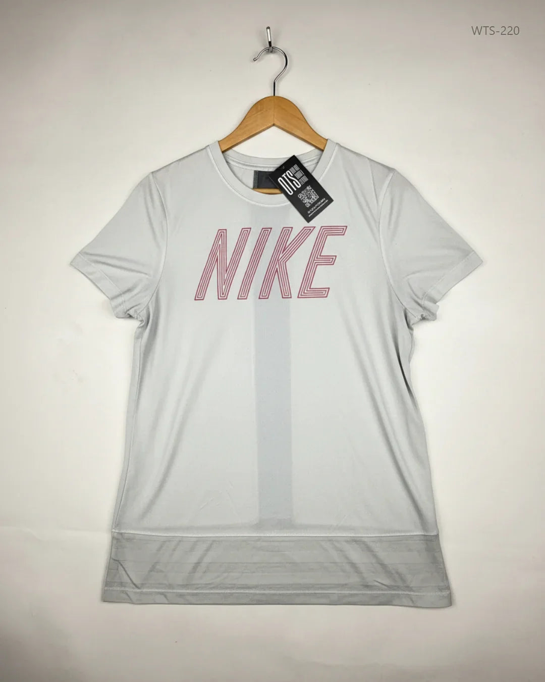 Preloved Premium Womens Tshirts by NIKE, OffWhite Polyester for - OTS Thrift Shop Lahore Pakistan